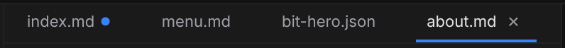 The tab strip with several open files, one showing the unsaved-changes dot